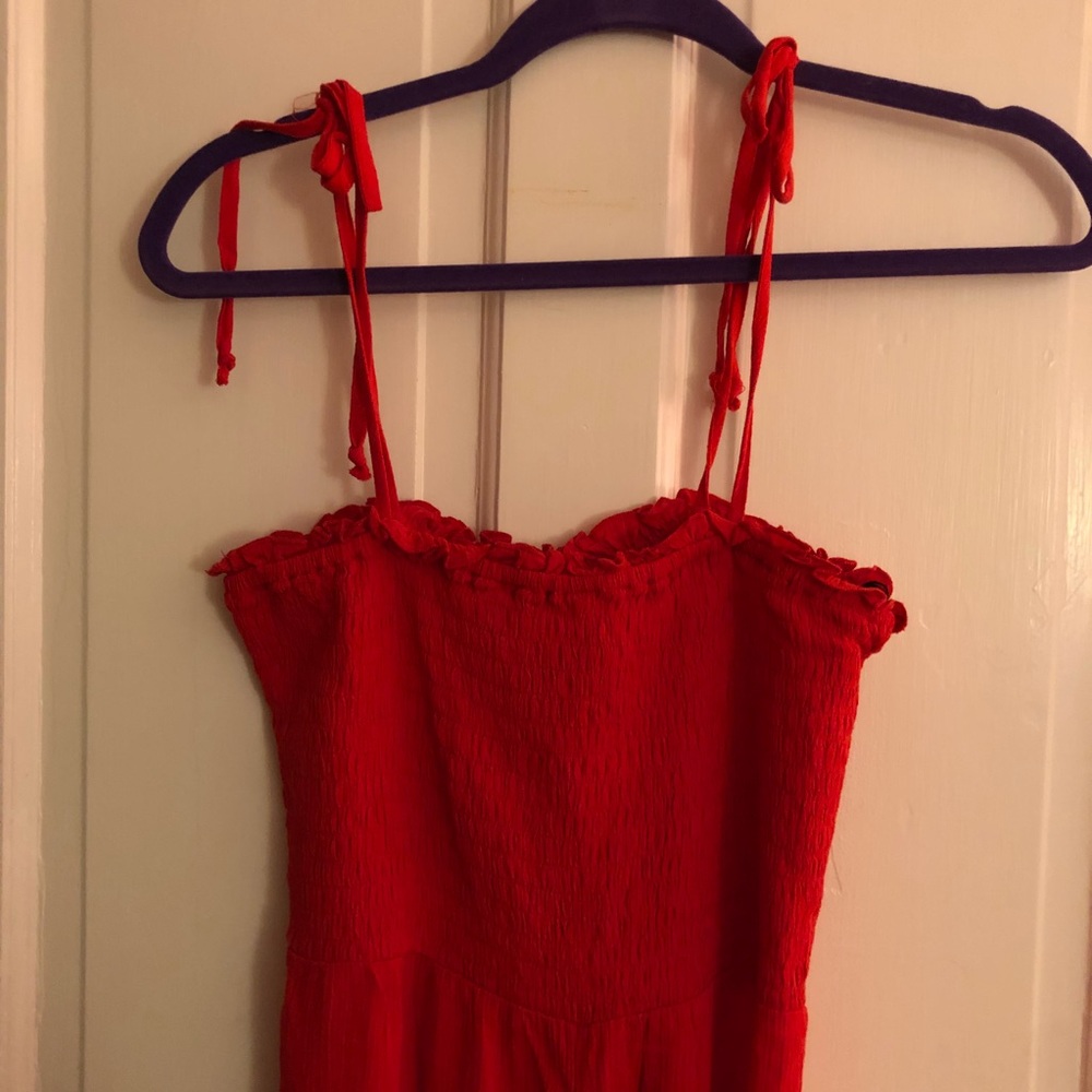 RED STRAP JUMPSUIT